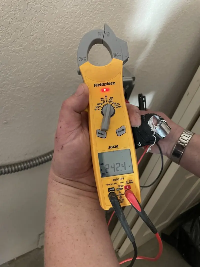 Voltage testing with clamp meter during Generator Installation in Hawaiian Gardens